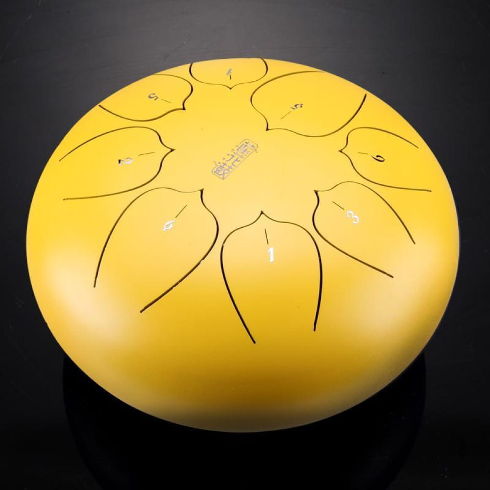 Yellow Carbon Steel Tongue Drum with petal-shaped tone markings in C Key