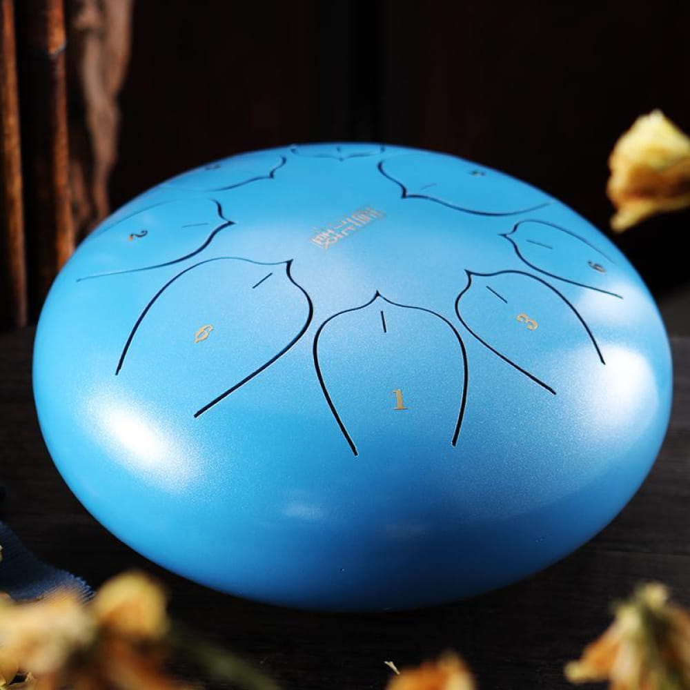 Light blue steel tongue drum with black patterns in a compact design, 8-tone C key