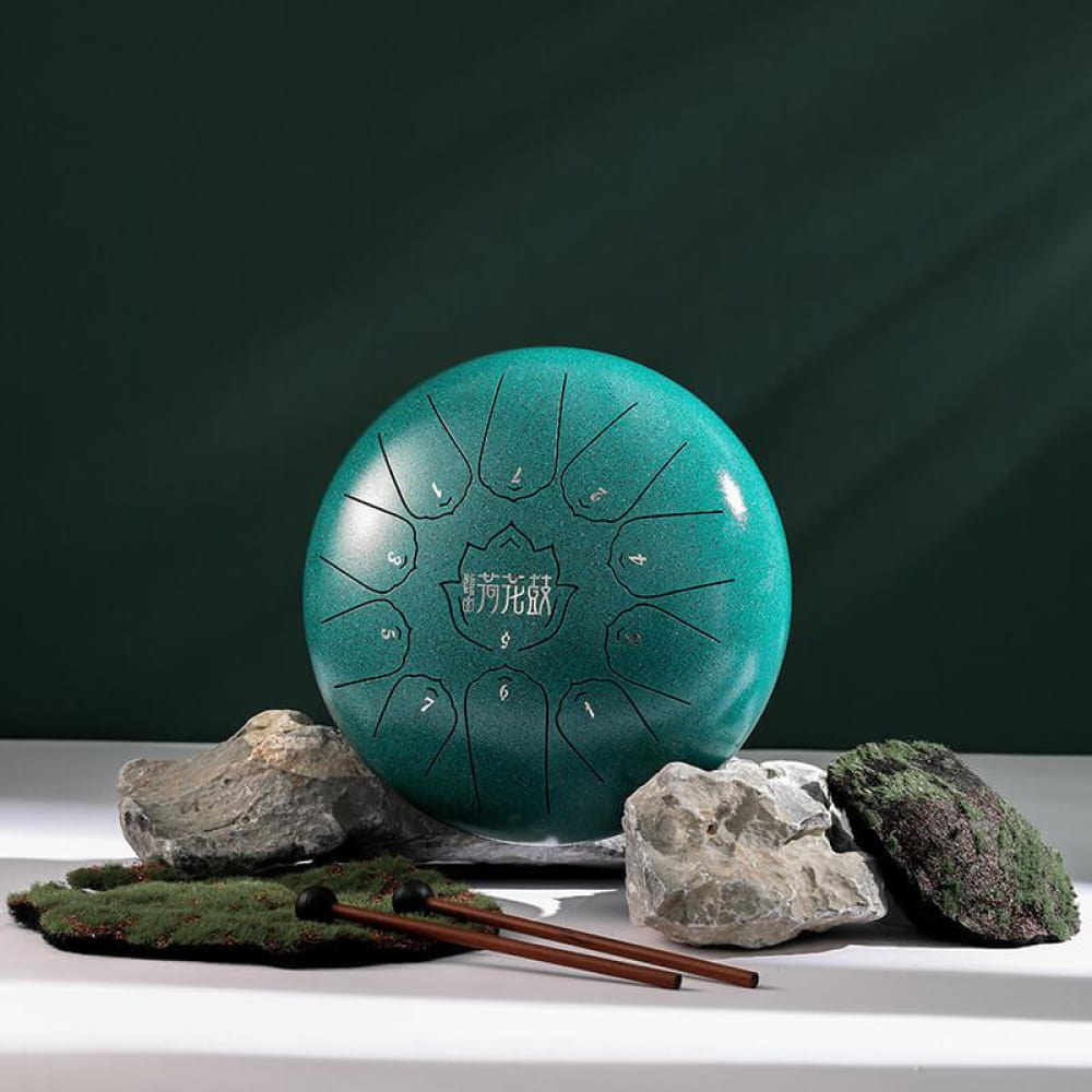 Turquoise Carbon Steel Tongue Drum with patterned divots, 11 notes in C Major