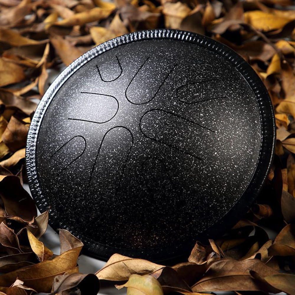 Black metallic handpan drum with textured surface, perfect for 10-Inch Copper Disc