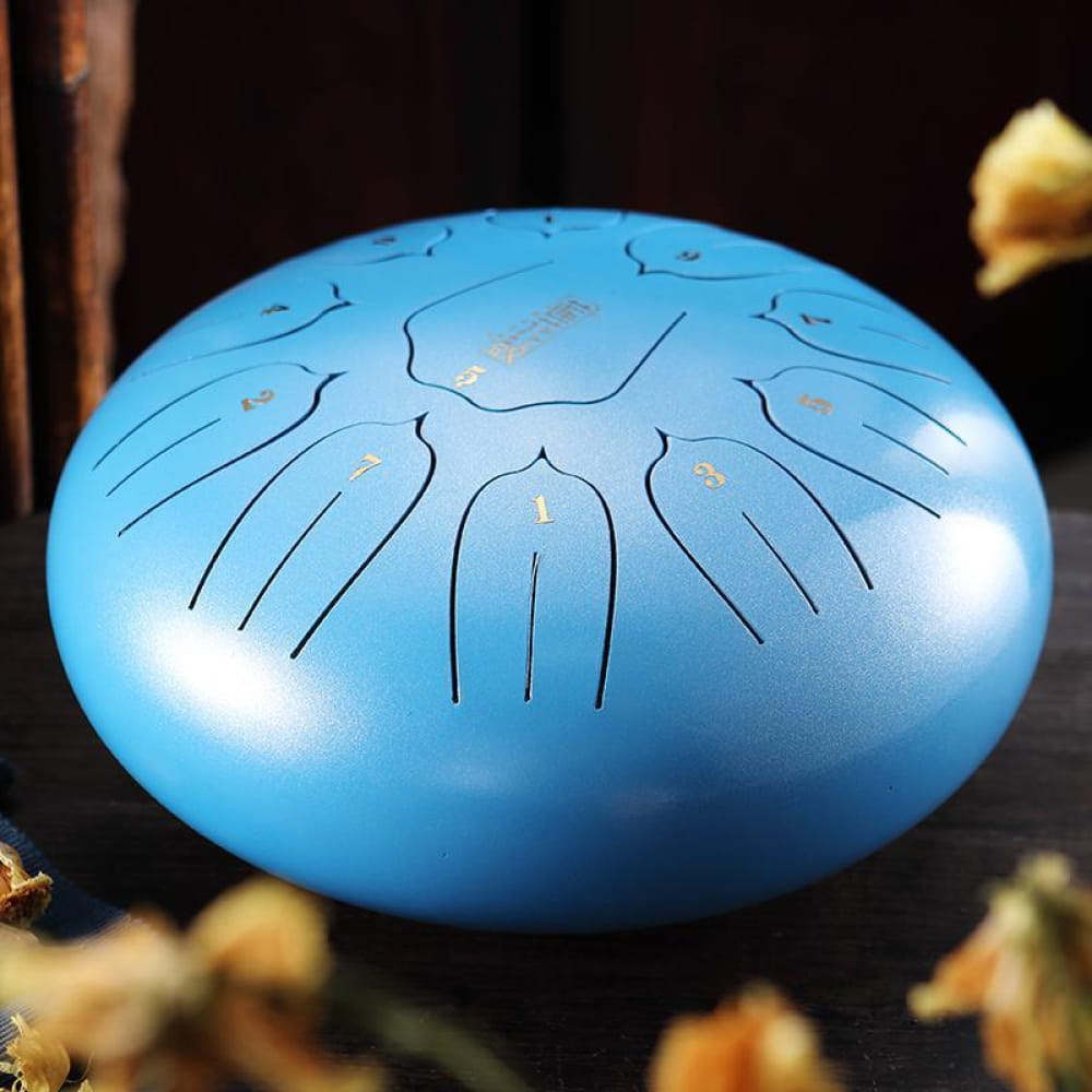 Light blue Carbon Steel tongue drum with 11-tone C key and etched markings