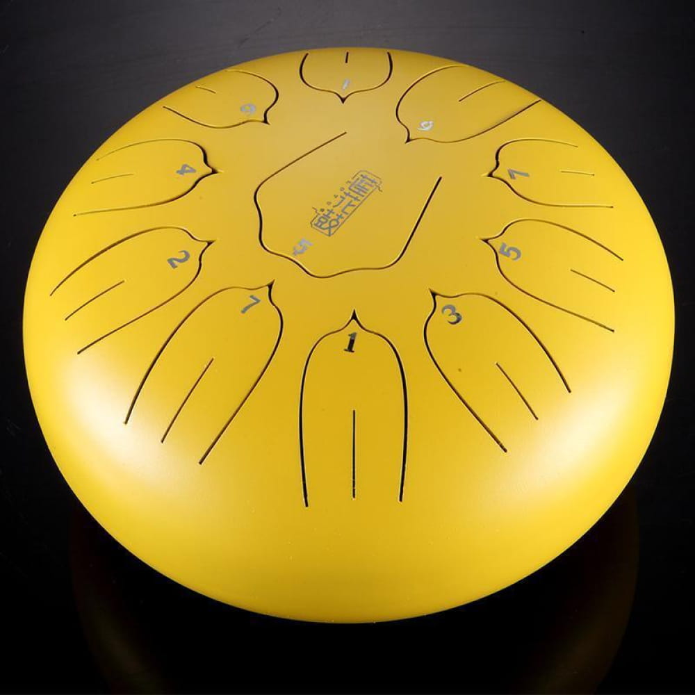 Yellow steel tongue drum with tone markers in a 12 inch Carbon Steel 11-Tone C Key