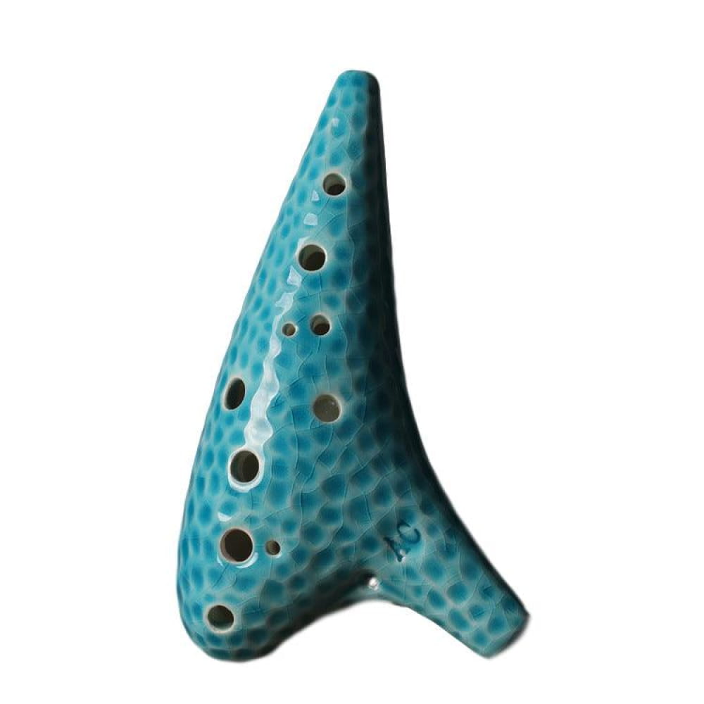 Turquoise ceramic 12 Hole Alto C Ocarina with dimpled texture and finger holes