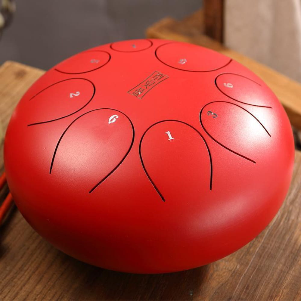 Red steel tongue drum with numbered tone zones for 12-Inch 8-Note C Key model