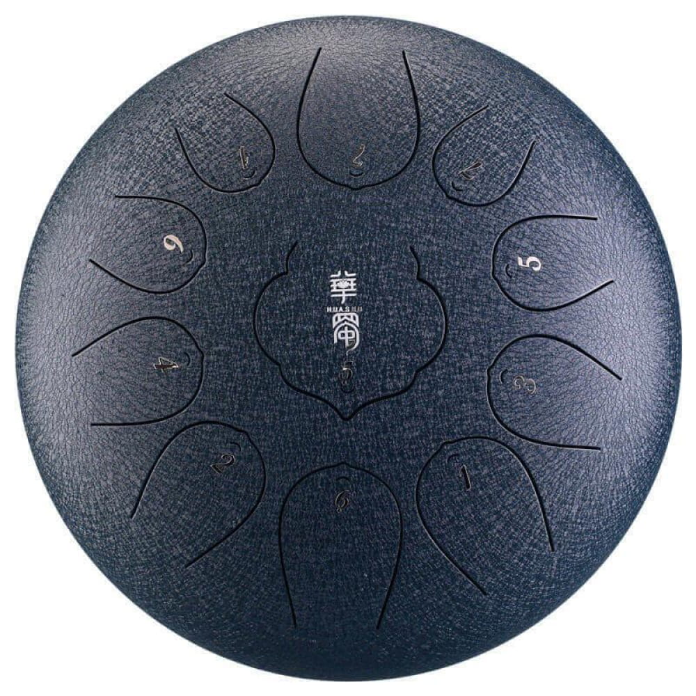Dark steel tongue drum with petal-shaped tone zones in a circular pattern for music