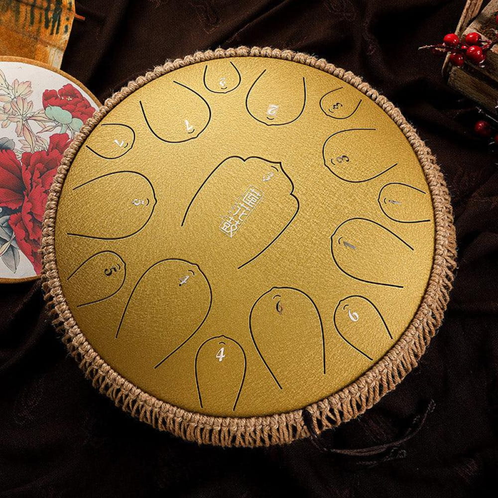 Golden steel tongue drum with patterned notes in a 13-Inch D Key design