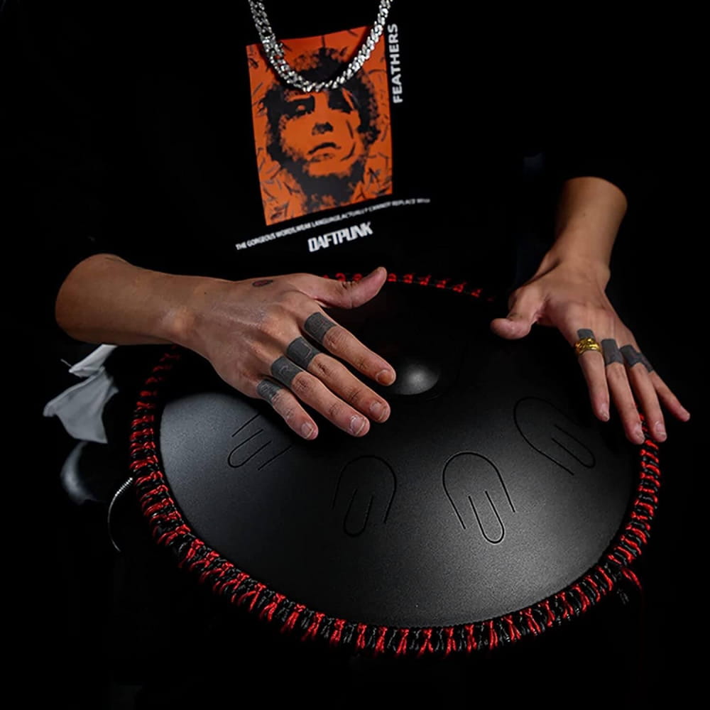 Black handpan drum with red stitching, 14 Inch 9 Note D Minor Alloy Steel Tongue Drum