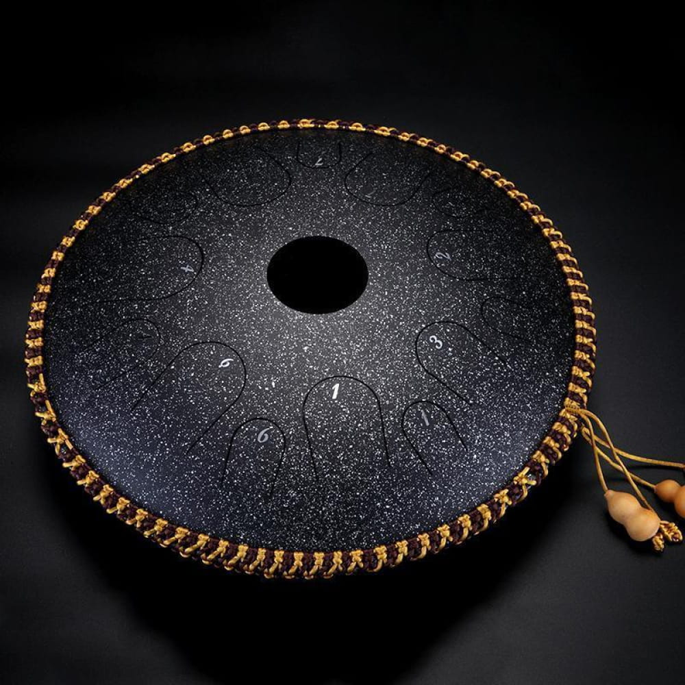 Circular black steel saw blade with copper edging and tassels for 14-Inch Tongue Drum