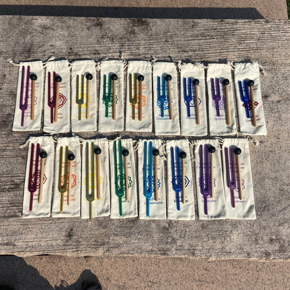 Colorful insulin pens in rows, showcasing the vibrant 17-Piece Solfeggio Chakra Set