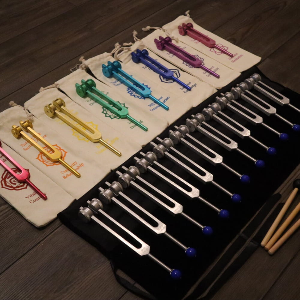 Colorful tuning forks in a display for the 19pc Chakra & Planetary Tuning Fork Set