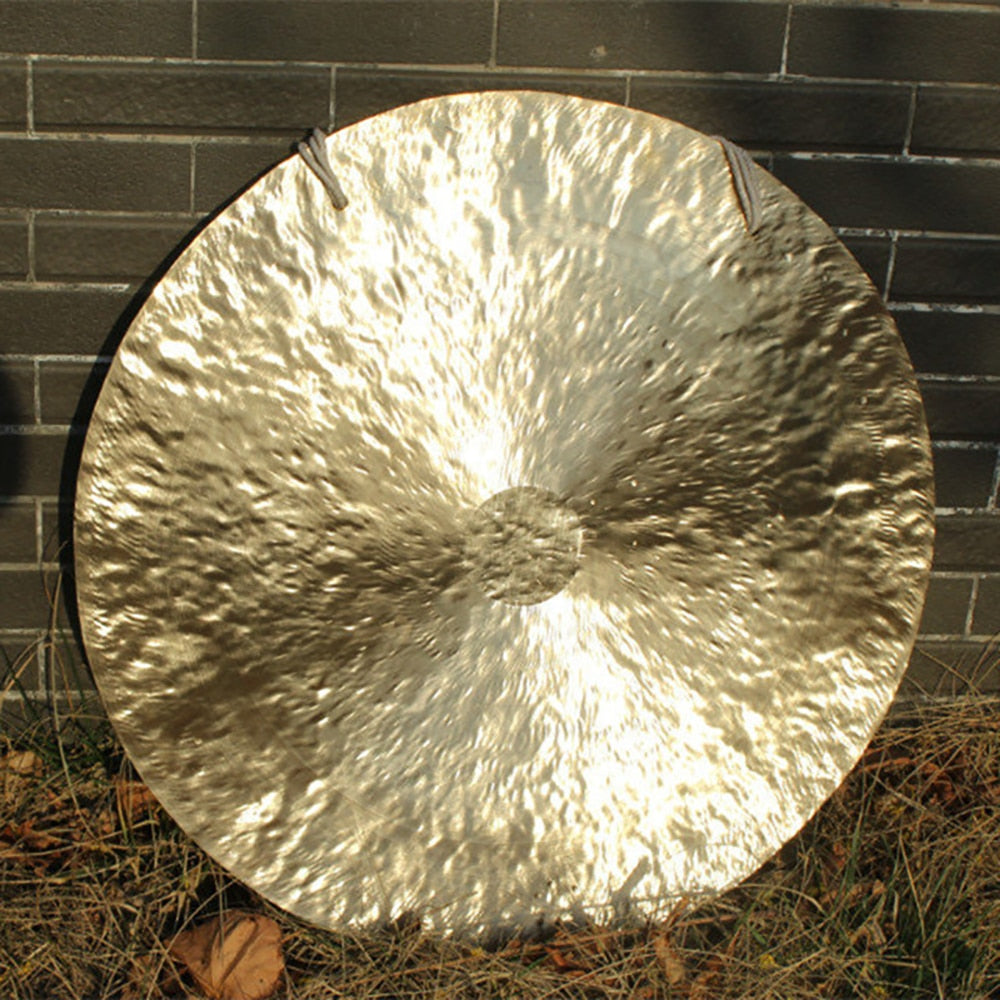 Circular metallic gong with textured surface for sound healing in 26’’ Wind Gong set