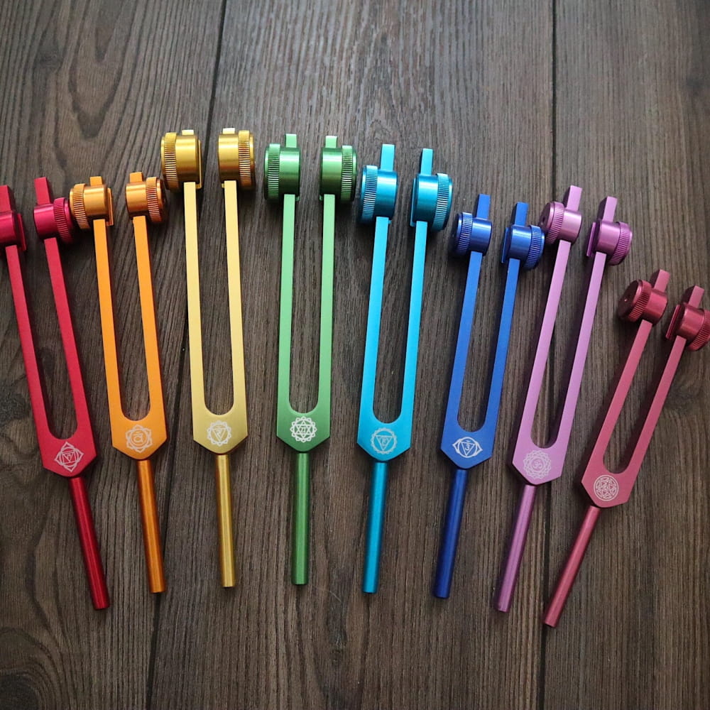 Colorful tuning forks in rainbow pattern from 34pc Solfeggio & Chakra Tuning Fork Set