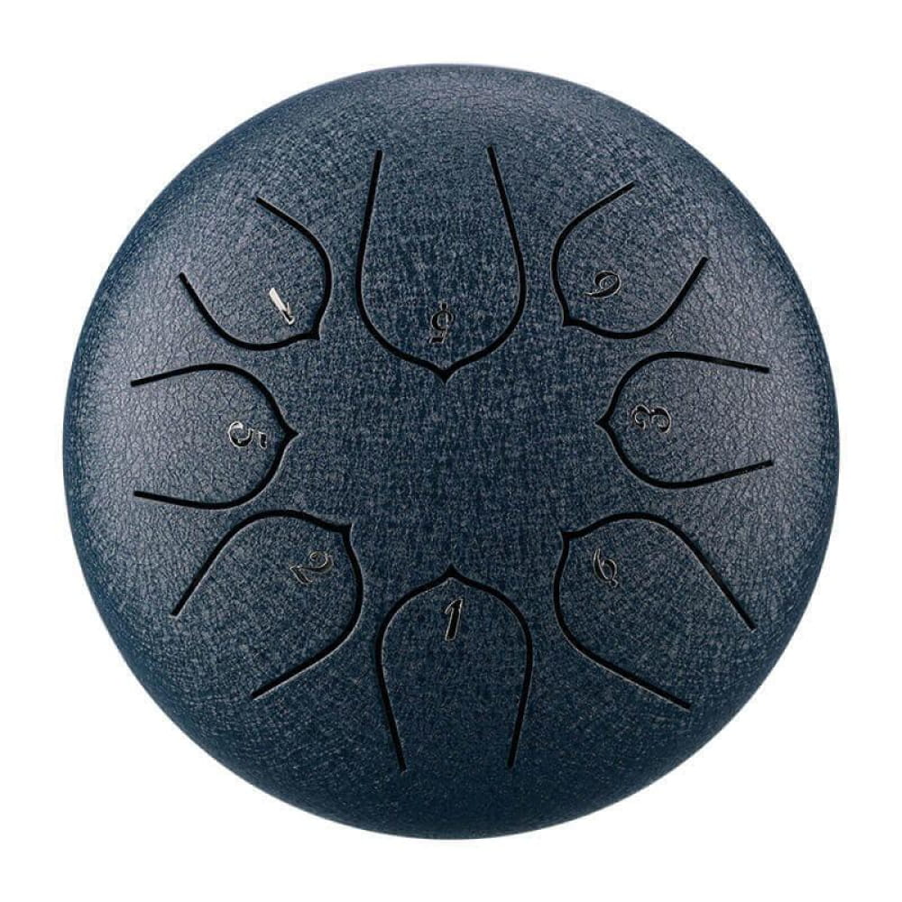 Dark steel tongue drum with eight petal tone fields in circular pattern for music making