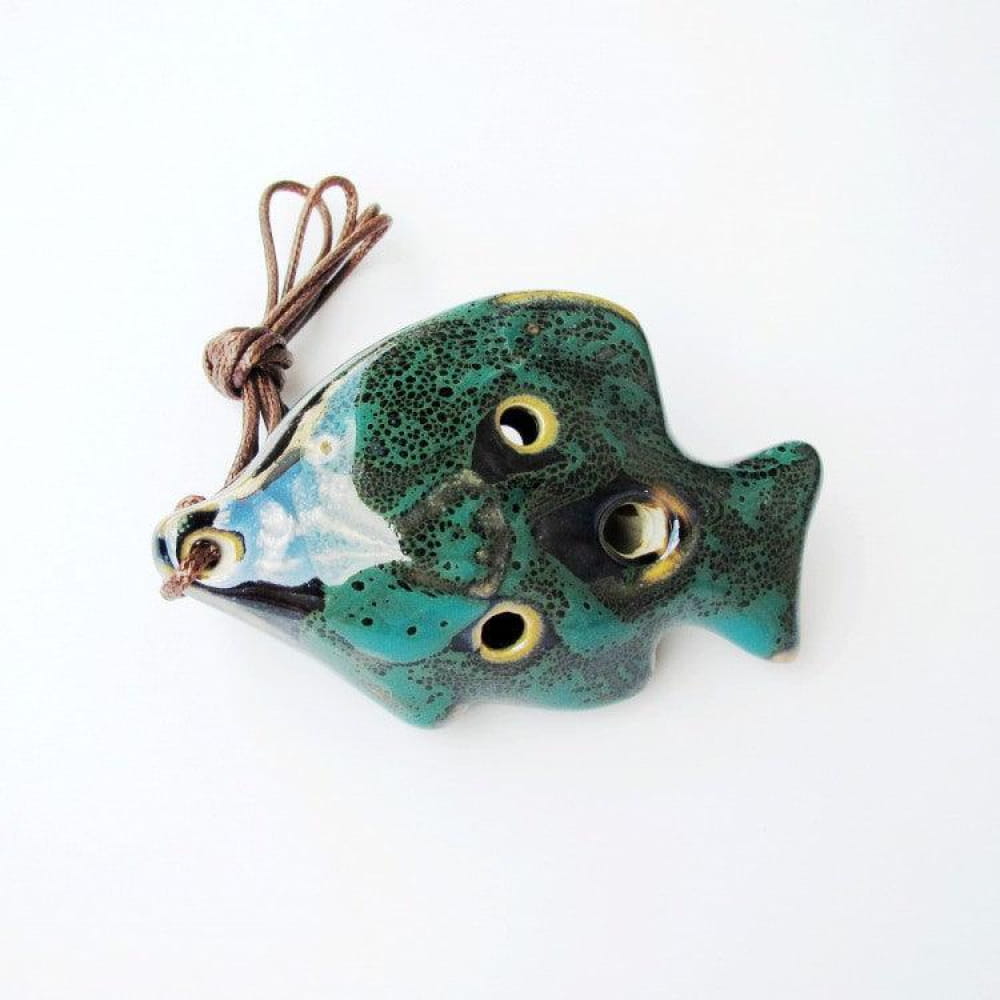 Turquoise ceramic fish ornament with yellow eyes on leather cord for 6 Hole Alto C Ocarina