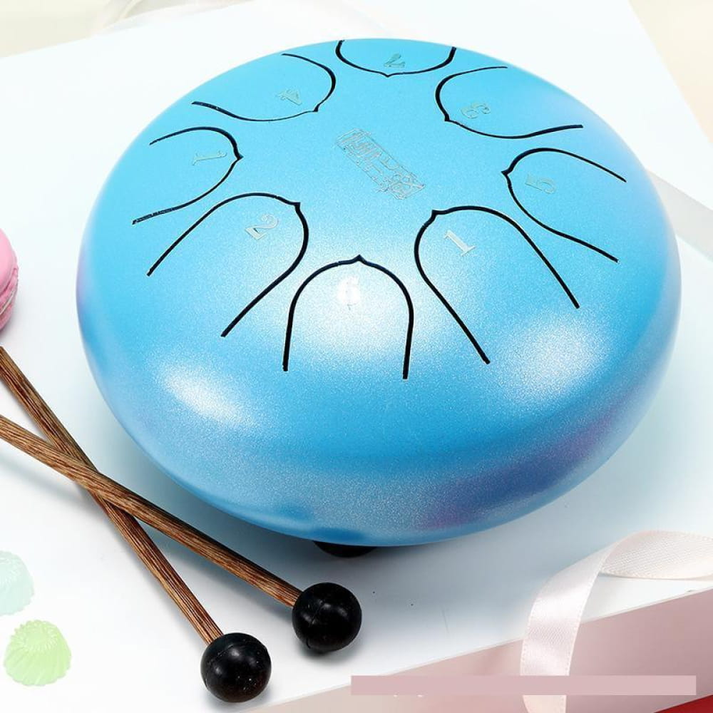 Light blue 6-Inch Steel Tongue Drum with black curved lines and two mallets for beginners