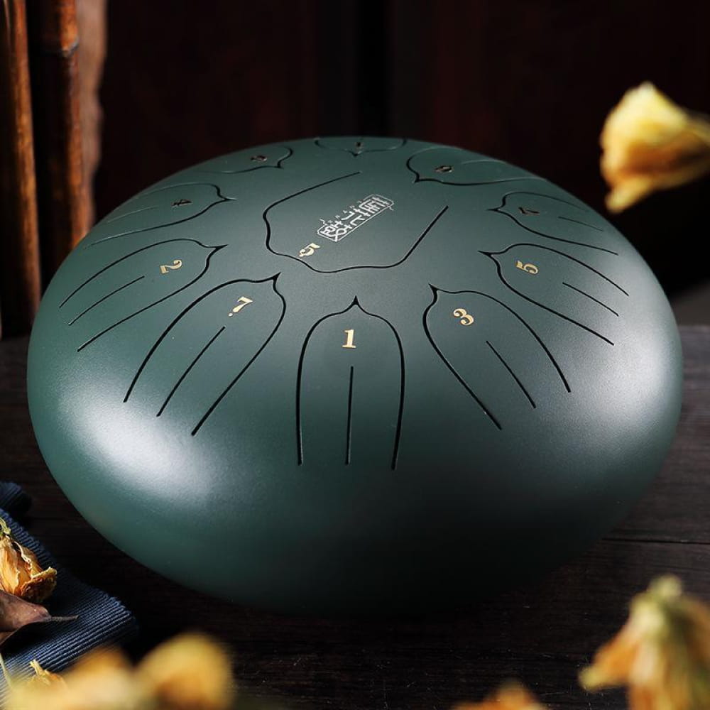 Dark green steel tongue drum with etched tone markers for beginners and kids