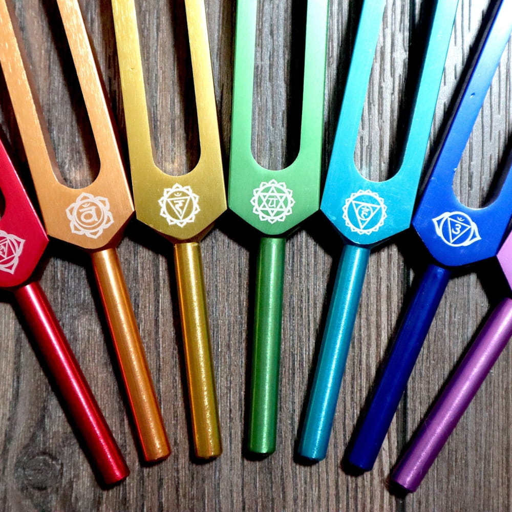 Rainbow-colored Chakra tuning forks for sound therapy and energy alignment