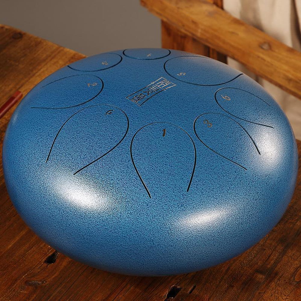Blue metallic 8-Tone D Key Steel Tongue Drum with curved tone markings, 10 Inch instrument