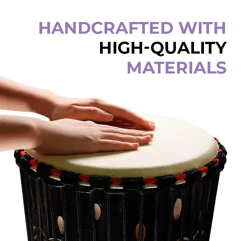 African Djembe drum made of Mahogany wood with hands resting on goat skin drumhead