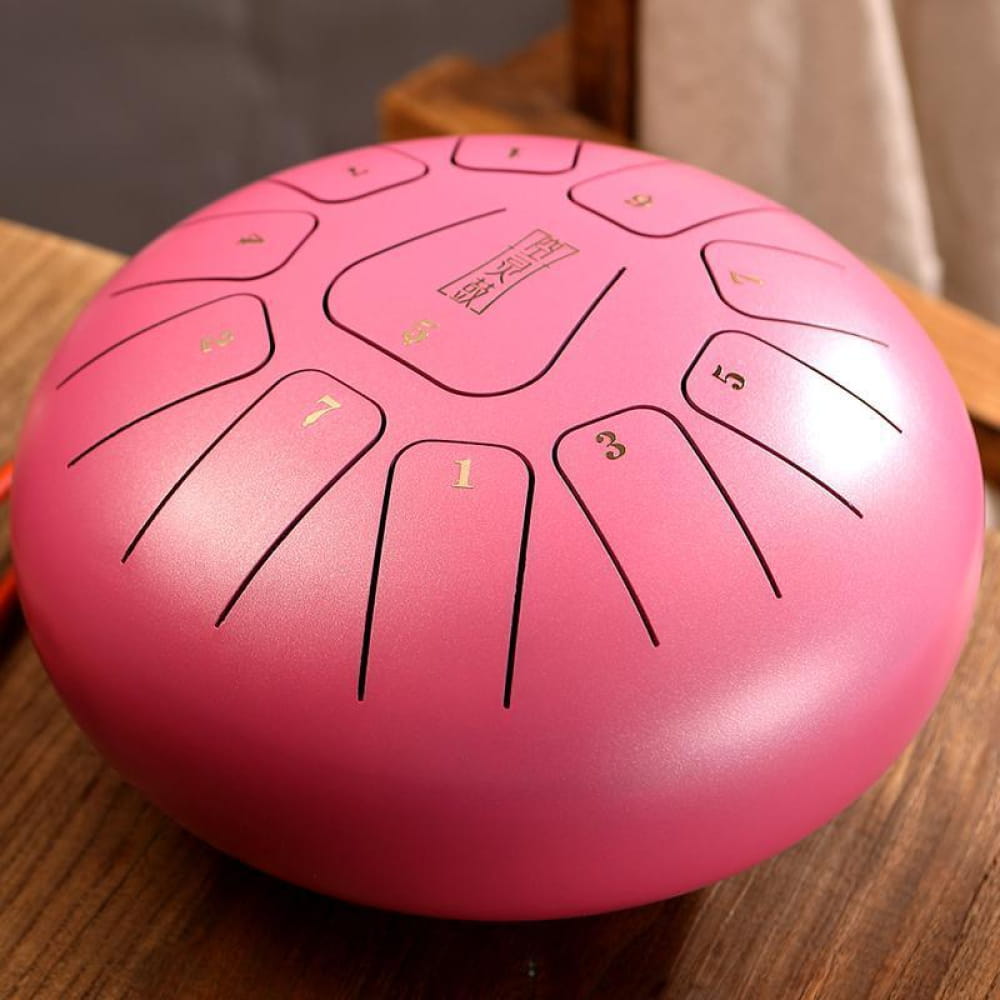 Pink Carbon Steel Tongue Drum with numbered sections in C Key, 11 notes