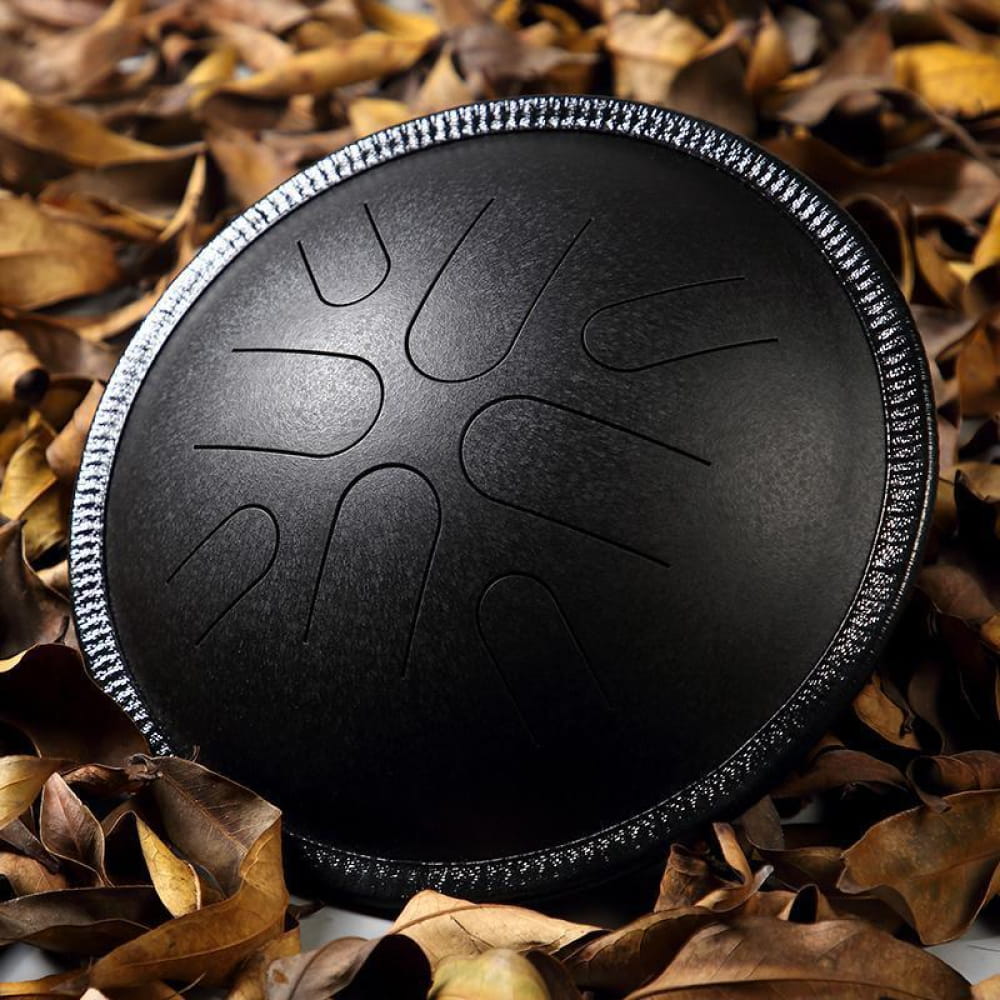 Black steel tongue drum with geometric patterns in 10-Inch Copper Disc style