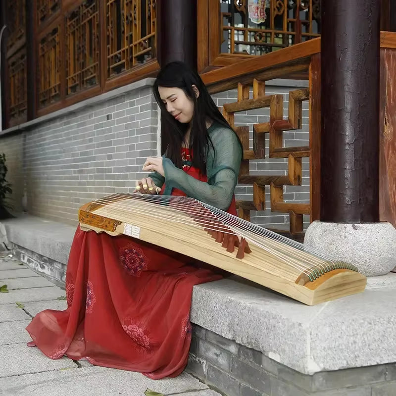 Traditional Chinese Guzheng, a 21-string zither made of Paulownia wood