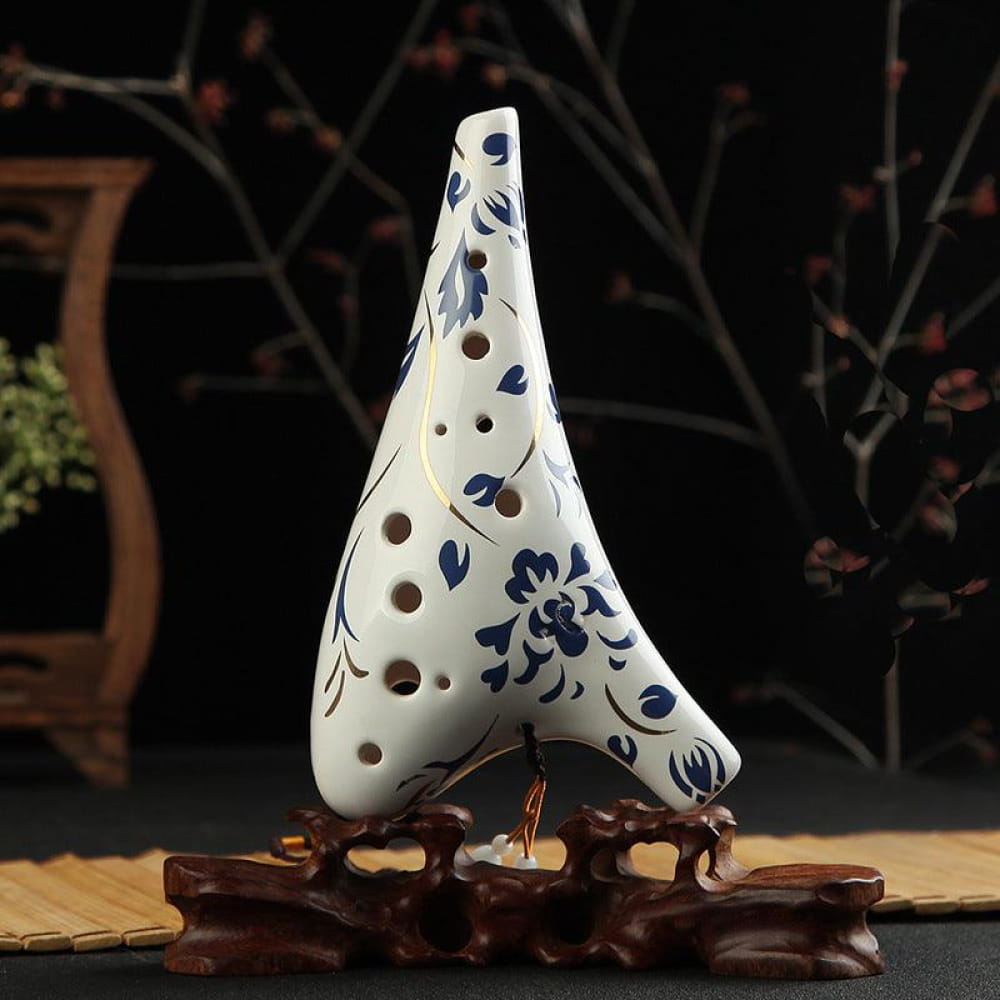 White ceramic 12 Hole Alto C Ocarina flute instrument with blue floral patterns