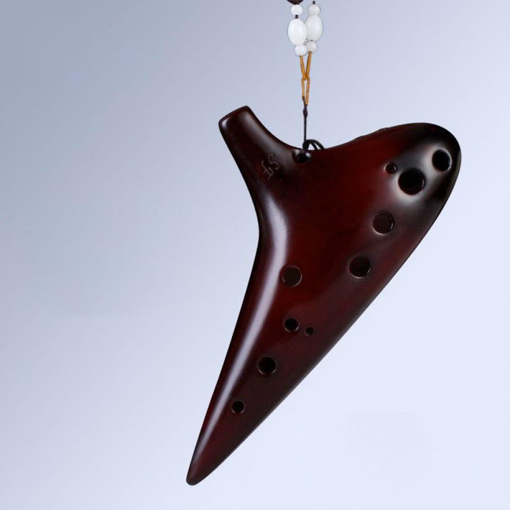 Dark brown ceramic 12 Hole Soprano F Tone Ocarina with finger holes for musicians