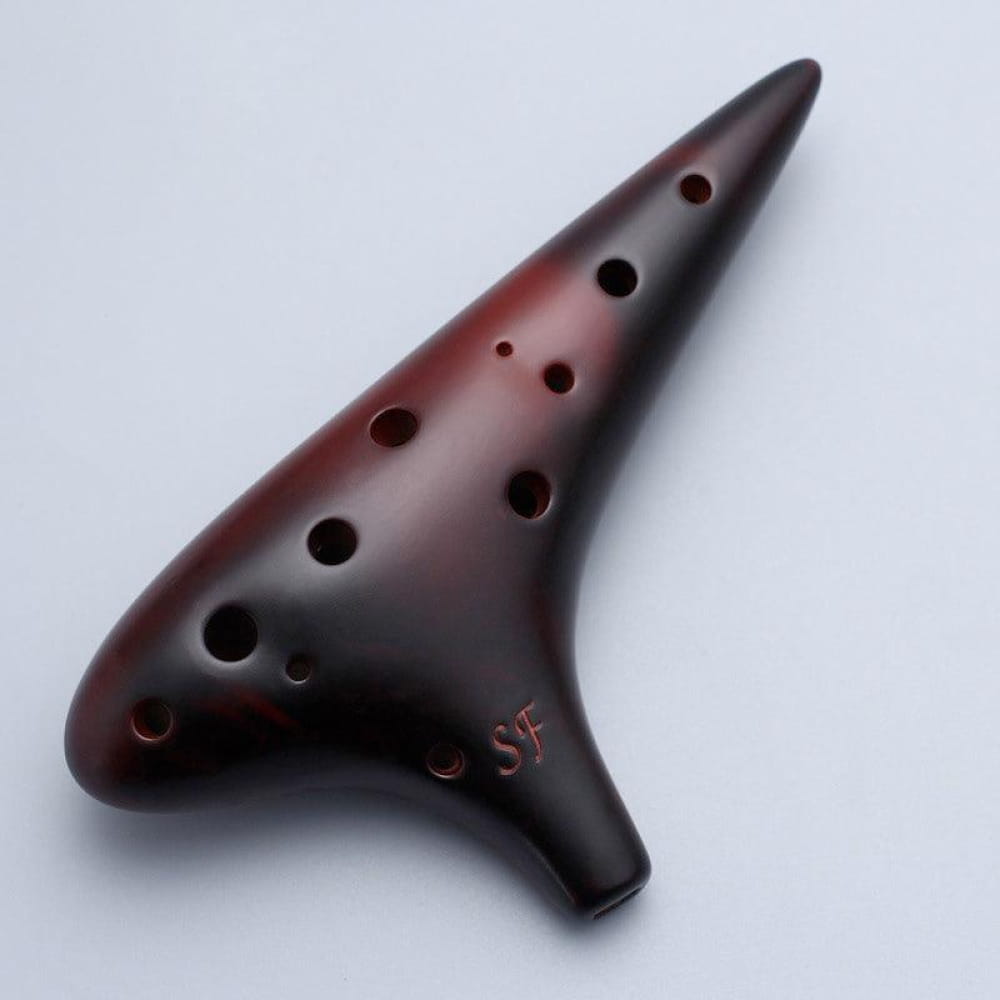 Dark reddish-brown ceramic 12 Hole Soprano F Tone Ocarina Flute Instrument with finger holes