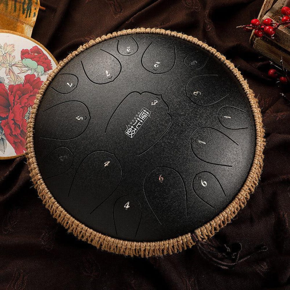 Black steel tongue drum with numbered zones and rope edge, 13-Inch D Key 15 Notes
