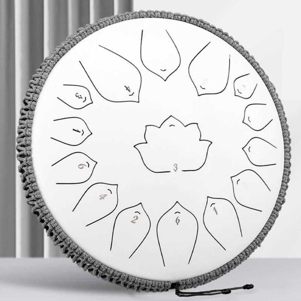 Circular steel tongue drum with lotus pattern, 15 notes in C Major, beaded trim