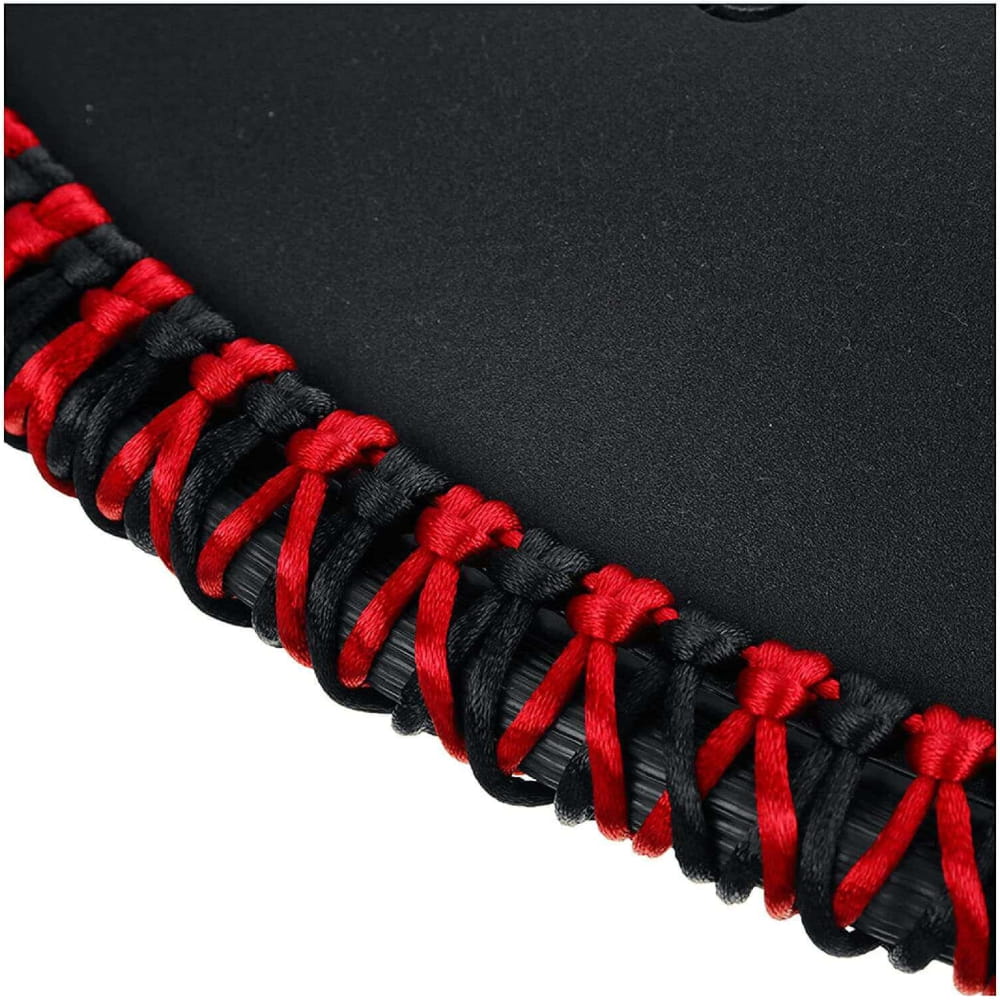 Red and black laced leather stitching on a 14 Inch D Minor Alloy Steel Tongue Drum