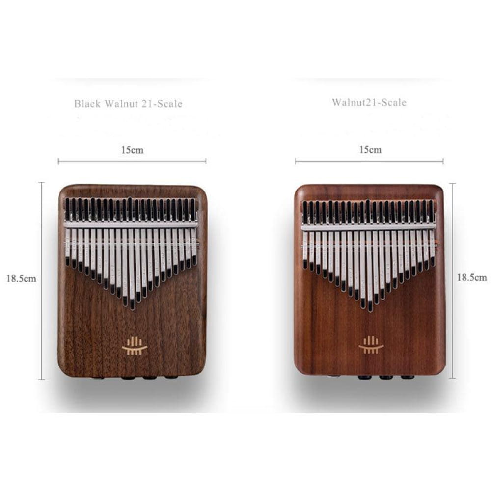 Two wooden Kalimba thumb pianos with metal tines in descending order