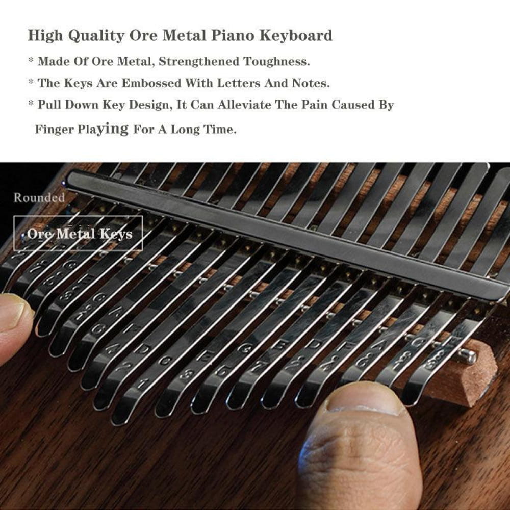 Metal Kalimba thumb piano with rounded keys and embossed notes for easy playing