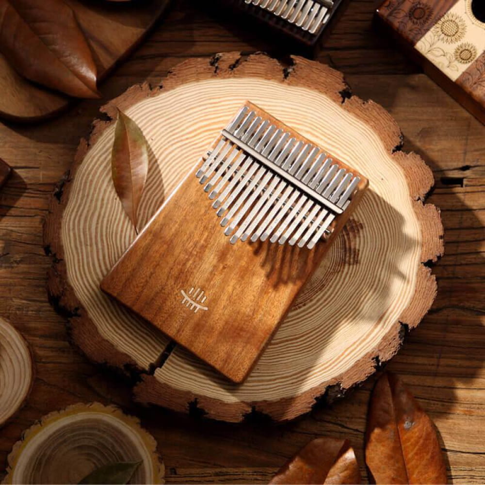 Wooden 17 Key Acacia C Tone Kalimba Thumb Piano with metal tines on flat board