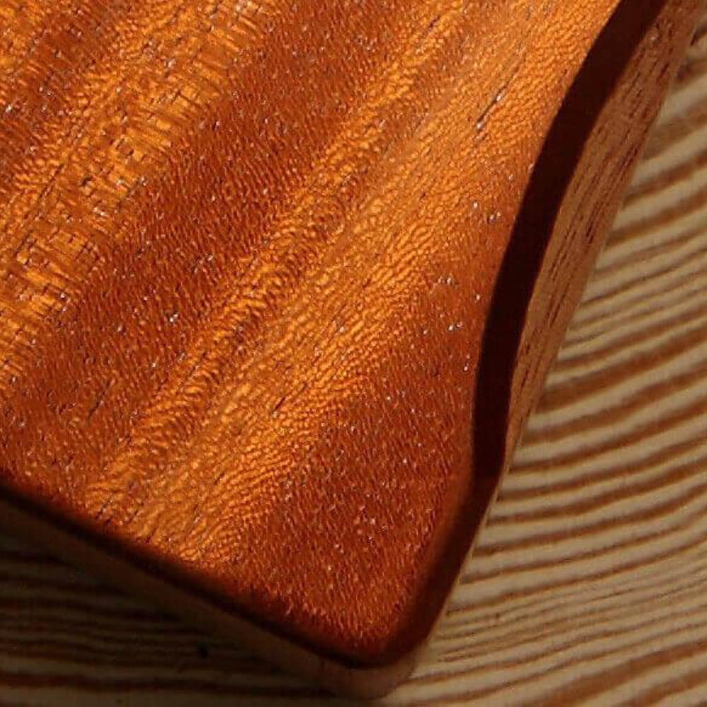 Polished wooden board highlighting the grain of the 17 Key Mahogany Kalimba