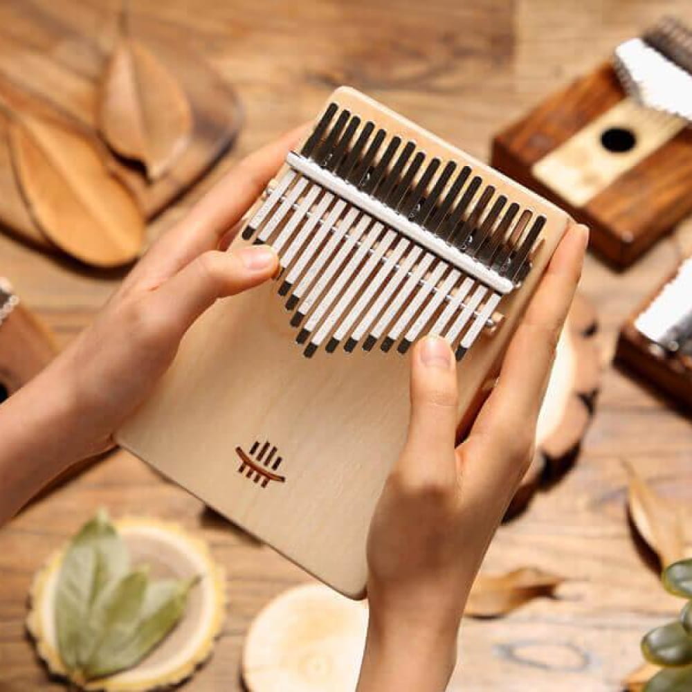 Kalimba thumb piano with metal tines on wooden soundboard for meditation practice