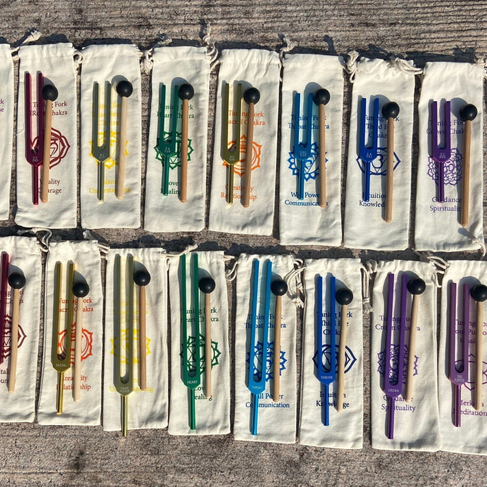 Colorful tuning forks in rainbow order from 17-Piece Solfeggio Chakra Set
