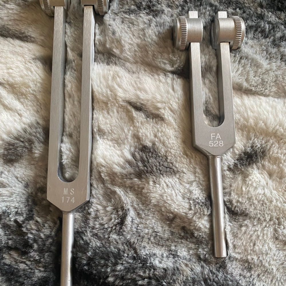 Two adjustable metal tuning forks with crystal handle for healing at 174 Hz and 528 Hz
