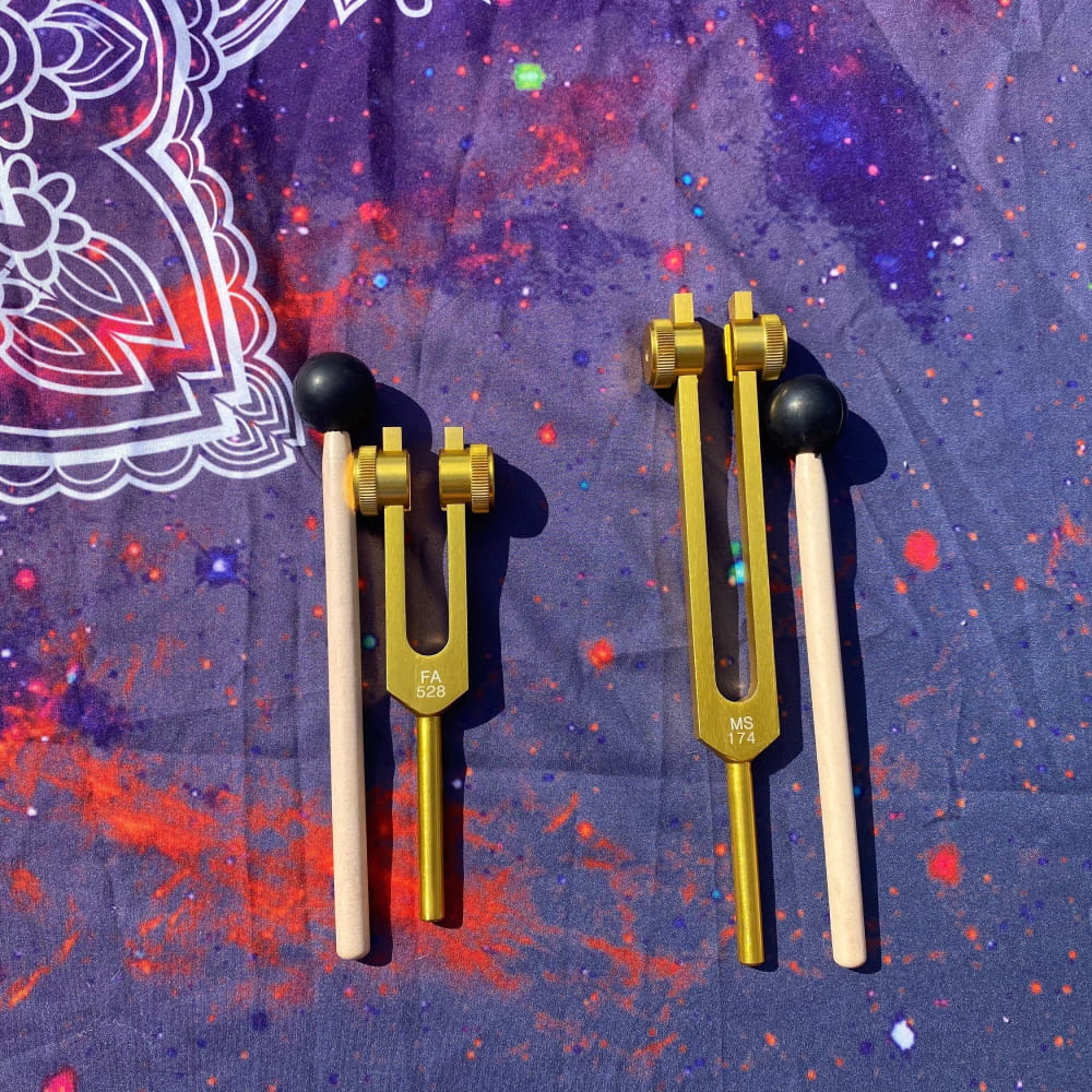 Golden Tuning Forks with Rubber Bases on Wooden Handles for Healing and Meditation