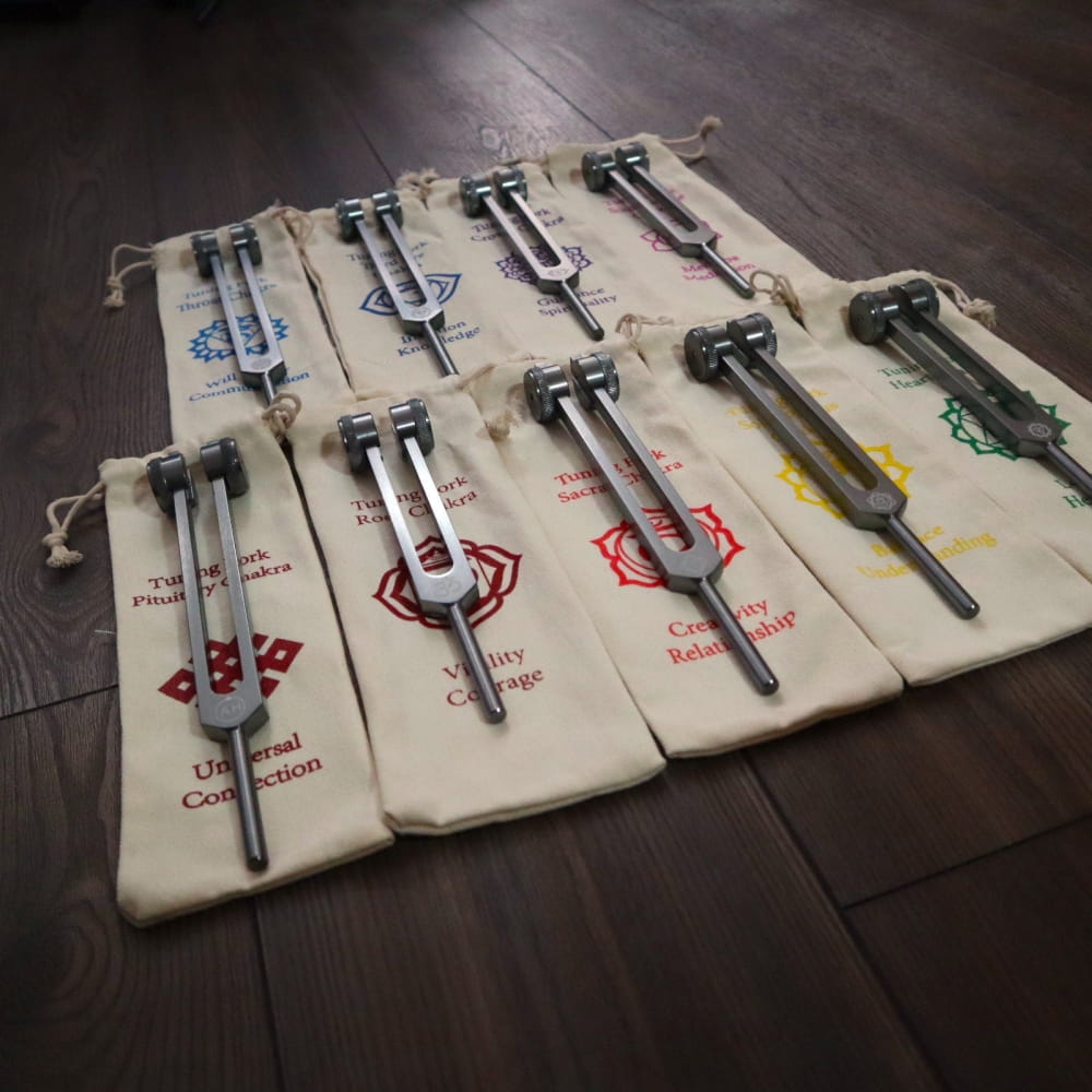 Collection of climbing nuts in protective fabric sleeves displayed on a surface