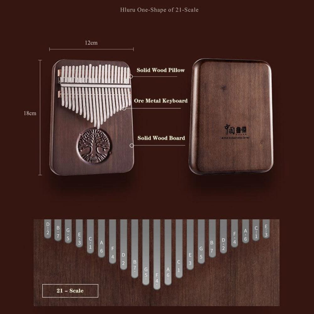Wooden 21 Key Walnut Thumb Piano with decorative tree design and metal tines for music