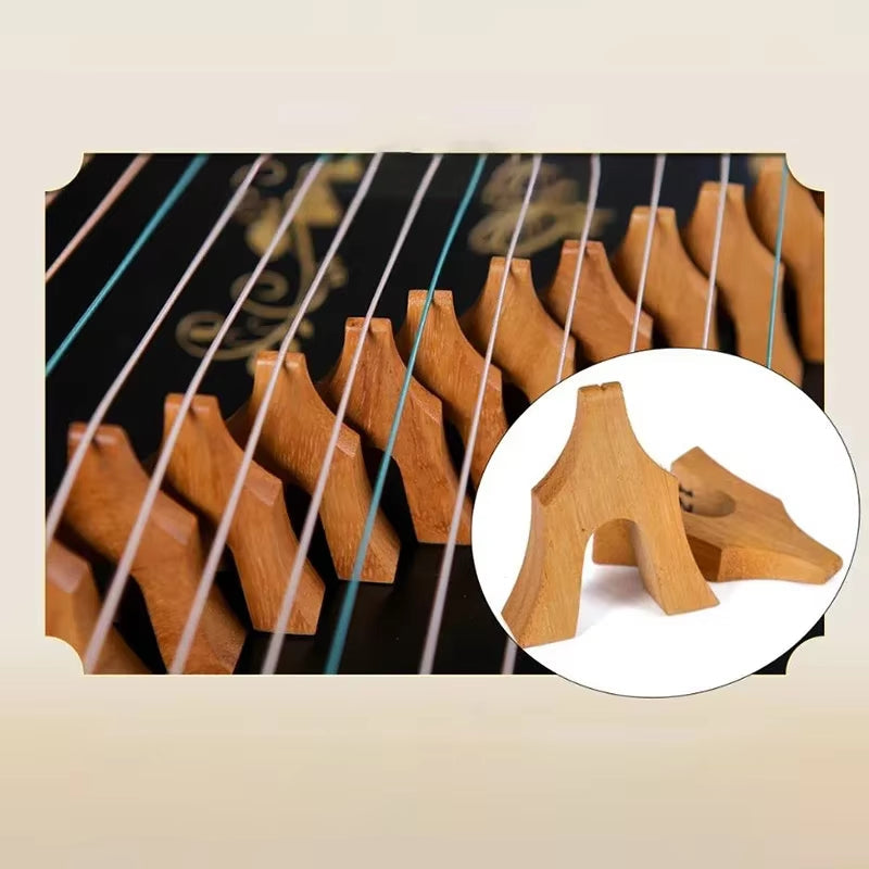 Piano hammers and strings with detail of a hammer in Mini Guzheng 21-String Zither