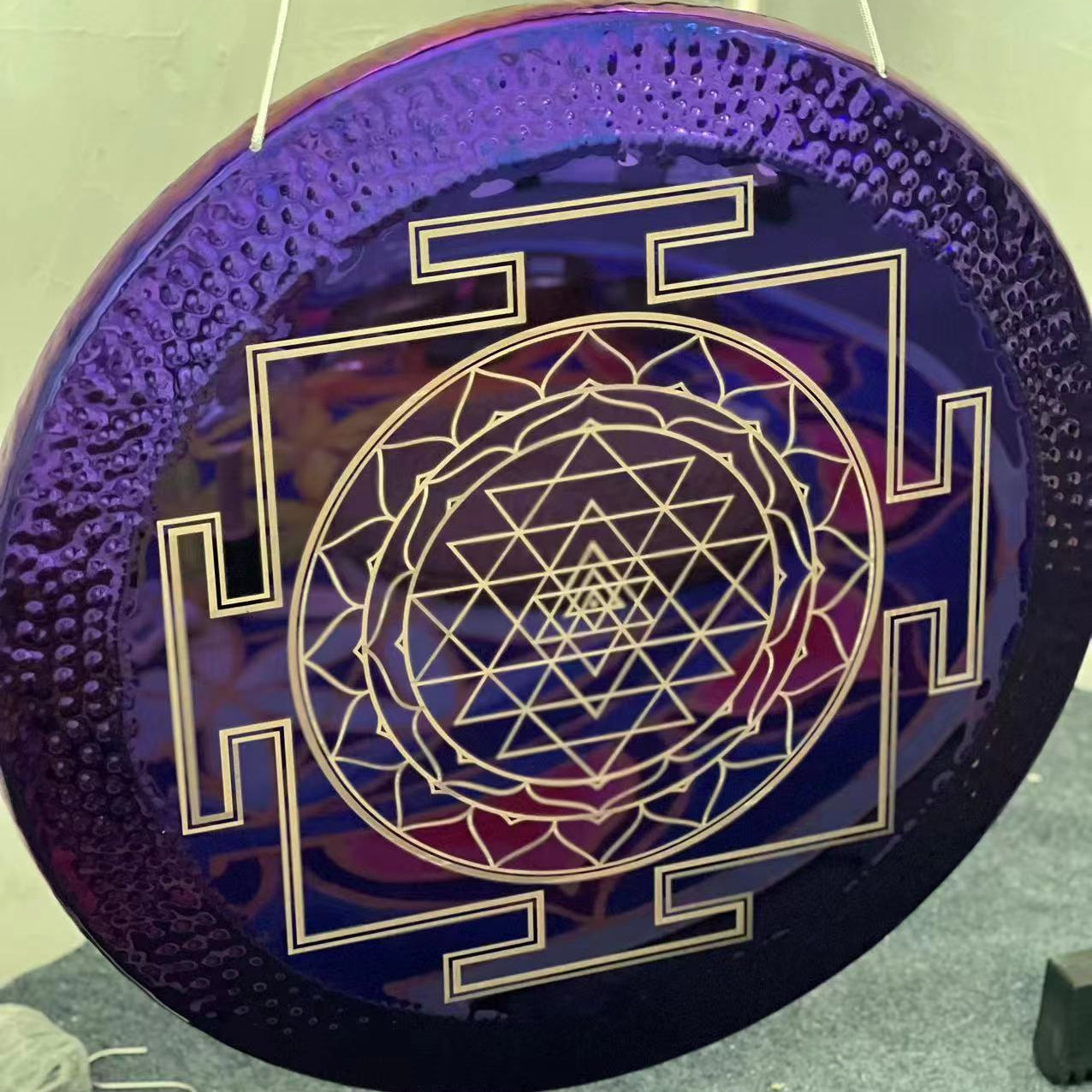 Purple circular disc with Sri Yantra pattern on 32’’ Sacred Geometry Gong for Sound Healing