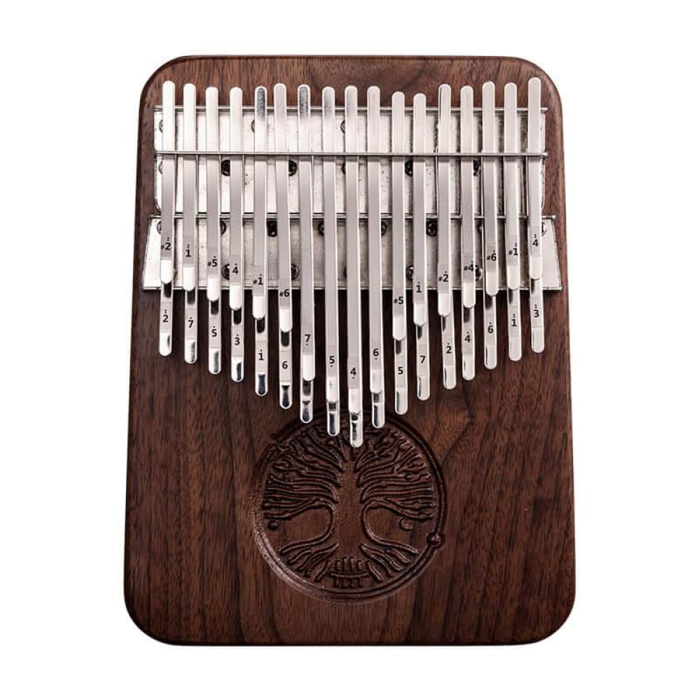 Wooden Kalimba thumb piano with metal tines and carved tree design for meditation