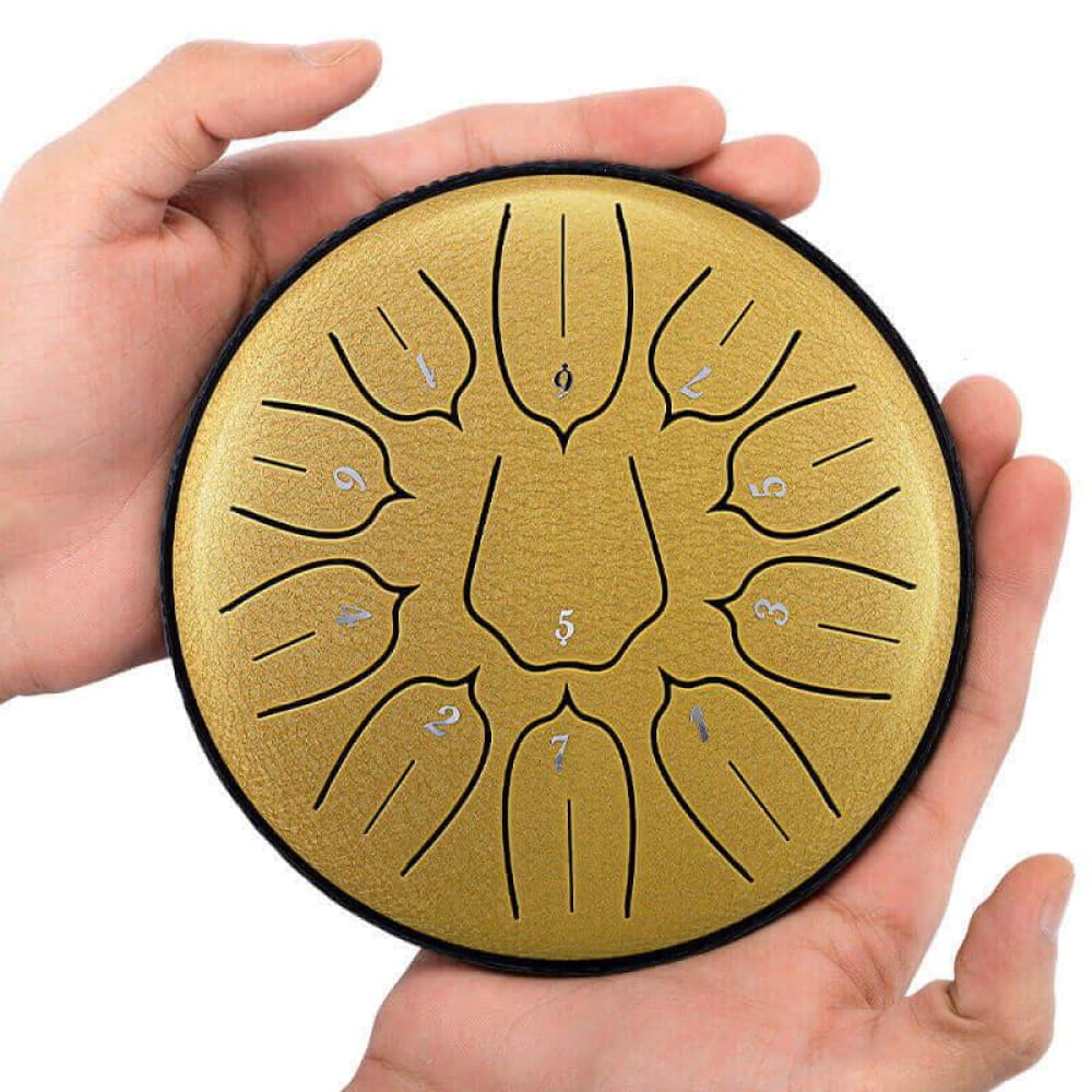 Golden circular tongue drum with petal sections in sunburst pattern, Lotus Design