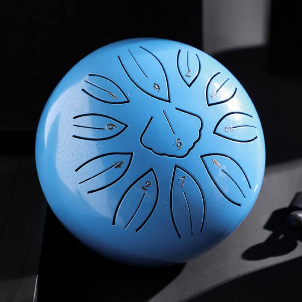Light blue steel tongue drum with petal markings in Lotus Design, 11-tone C/D key