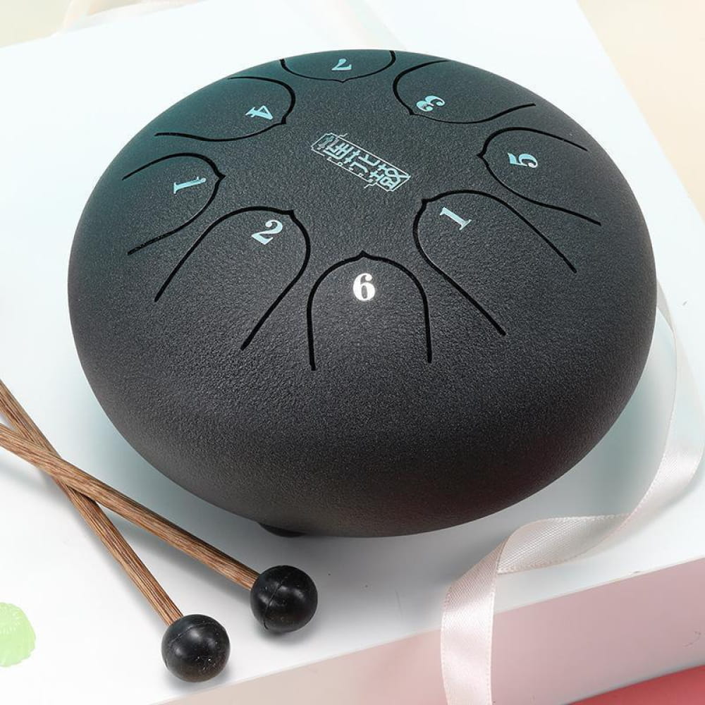 Dark steel tongue drum with numbered tone zones and mallets for kids and beginners