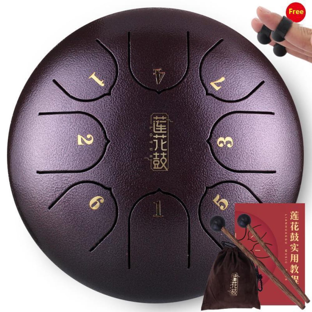 Dark purple 6-Inch Steel Tongue Drum with numbered sections and gold lettering for beginners
