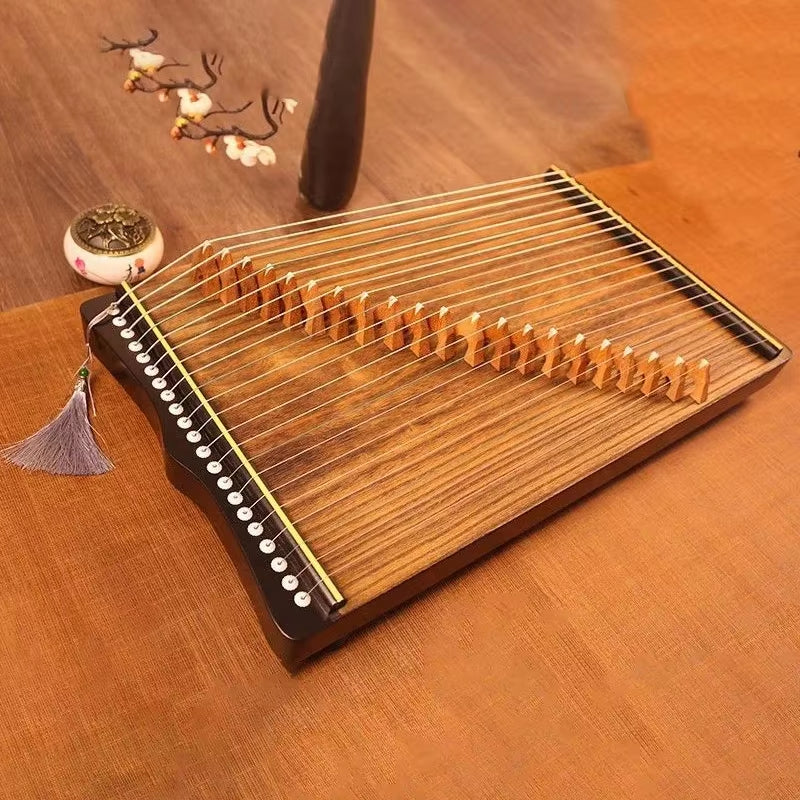 Traditional wooden 21-string Guzheng with decorative tassel and elegant design